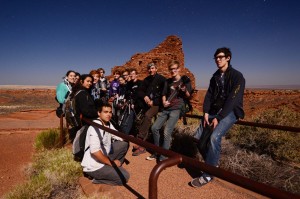 Lit by the nearly full moon, photo students from FALA pose by the Wupatki site. (click to enlarge)