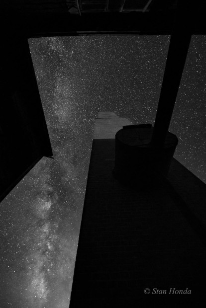 The Milky Way over the original chimney and boiler room at the Heart Mountain hospital.