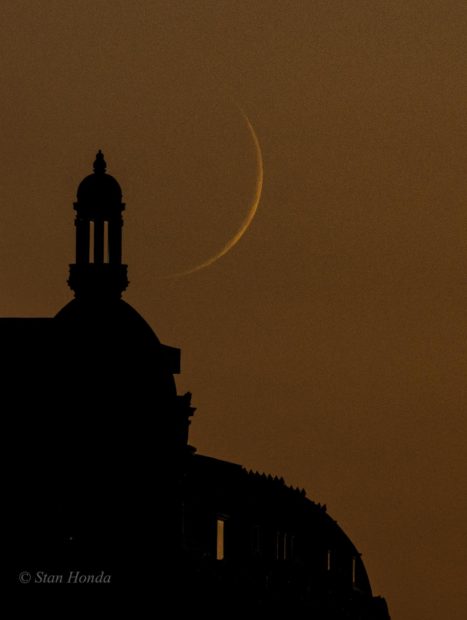 Crescent moon sets on west side of Manhattan, July 5, 2016.