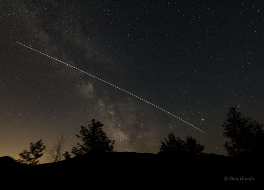 A time exposure of the ISS flying over Rocky